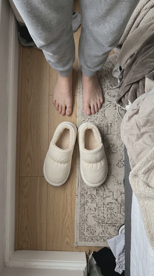 Morning: slipping into cream Cloowdy slippers by the bed